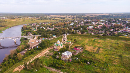 Fototapeta na wymiar Picturesque view of small ancient town Staritsa with Boris and Gleb Cathedral on the Volga River in Russia.