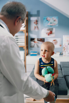 Pediatrician Examining a Boy
