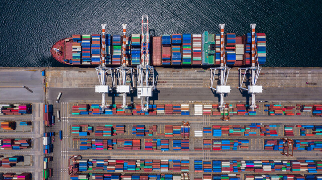 Aerial view container ship in commercial port, Business industry commerce global import export logistic transportation oversea worldwide, Sea shipping company vessel.