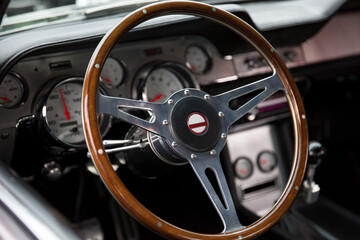 Steering wheel of a 1965 retro vintage car