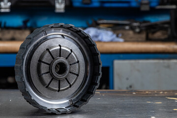Engine and gearbox spare parts. Shiny gears for planetary gearbox.Metal  autotechnology background....