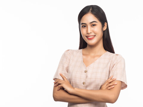 Portrait of smiling young asian business woman isolated on white background.