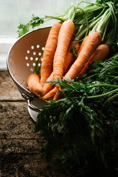 Carrots in a colander