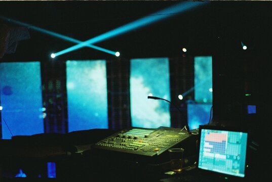 Control panel inside of a DJ booth in a music festival