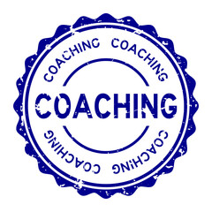 Grunge blue coaching word round rubber seal stamp on white background