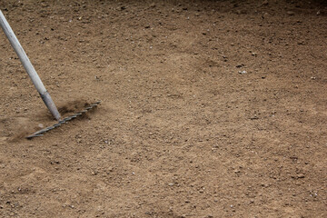 A rake on the ground