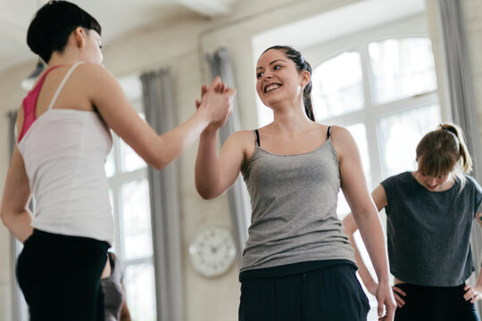Celebrating after workingout in aerobic class