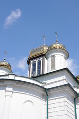 St. Alexander Nevsky Orthodox Church in Sokolka city in eastern Poland in summer over blue sky with clouds