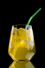  refreshing lemonade with lemon slices and ice cubes on black background
