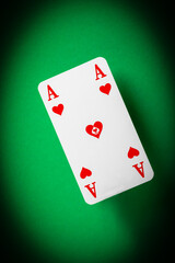 ace of hearts on green