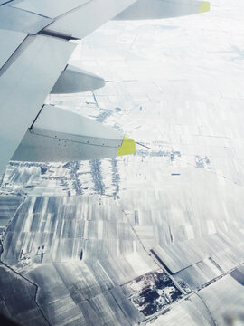 Airplane wing in flight.