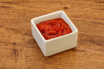 Tomato spicy sauce in the bowl