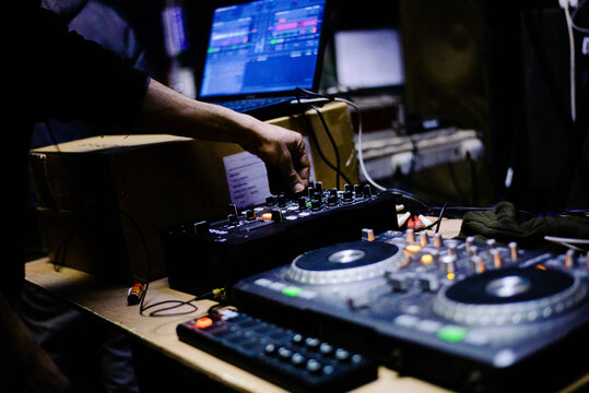 Male Hardcore DJ at a rave party