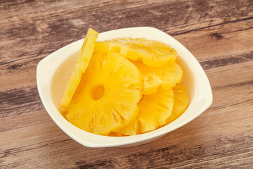 Marinated pineapple rings in the bowl