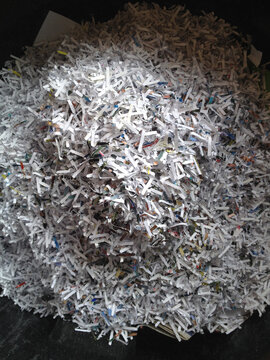 Overhead Look At Bin Full Of Shredded Paper Documents