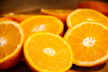 Naklejka na ściany i meble Bunch of fresh sliced oranges on a tray