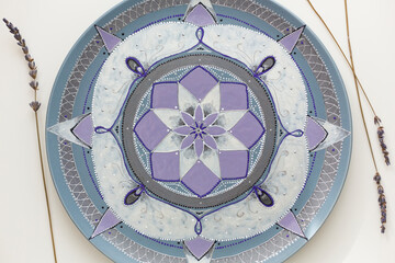 Decorative plate or platter, painted with violet, grey and silver acrylic paint