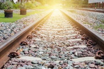 Thailand train railway track with vintage warm light, travel and transport concept