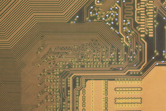 close-up of electronic circuit golden board background of computer motherboard