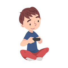 Cute Boy Sitting on Floor Playing Video Game, Teenage Kid Holding Controller Cartoon Style Vector Illustration