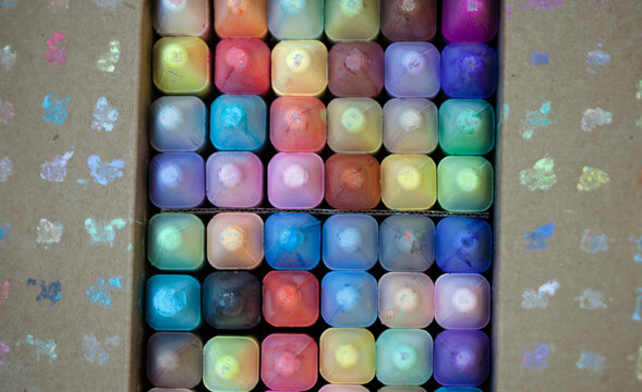 Close up of a box of new colorful chalk