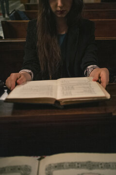 Girl sitting in the orthodox church