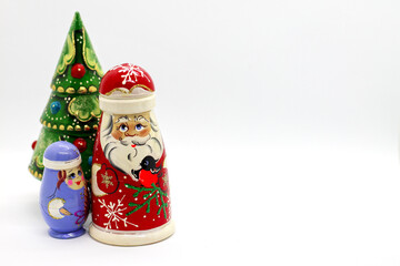  Russian wooden dolls - matrioshka. Father Frost, Snow-maiden and new year tree. Popular souvenirs from Russia
