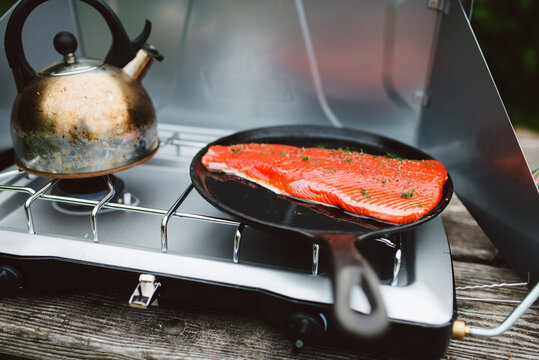 Fresh, delicious filet of salmon on a cast iron skillet