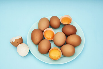 Chicken eggs on a saucer, a plate. Food, protein in foods.
