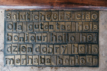 Doormat with greetings in different languages