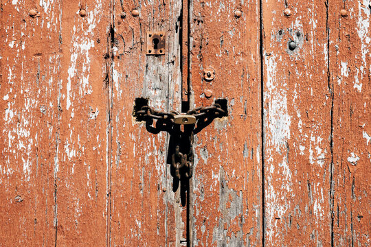 Padlock on old doorway, Provence, France
