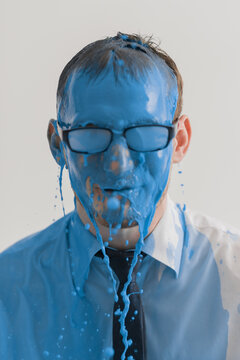 Businessman Portrait in blue paint