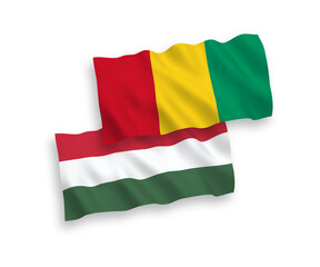 Fototapeta premium Flags of Guinea and Hungary on a white background