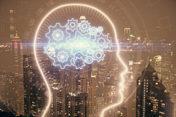 Brain hologram drawing on city scape background Double exposure. Brainstorming concept.