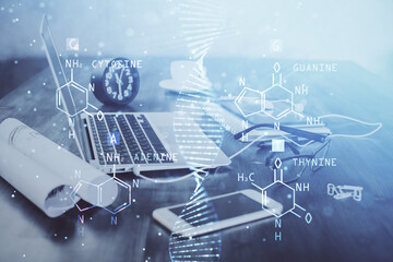 Desktop computer background and DNA drawing. Double exposure. Science concept.