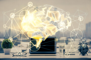 Double exposure of desktop with computer and brain drawing hologram. Artificial intelligence concept.