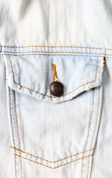 detail of bleached jeans jacket