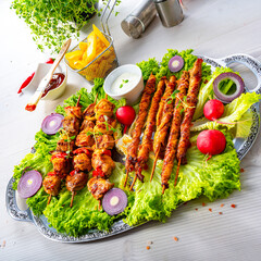 Grilled szaszlyk and meat flares with green salad