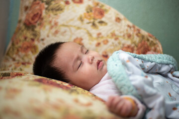 Obraz premium baby sleeping in bed