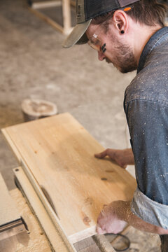 carpenter sawing