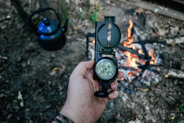 Bushcraft compass in the camping © sercansamanci