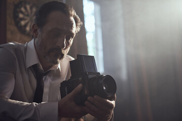 cinematic photo shoot of the confident actor celebrity look in foggy loft room