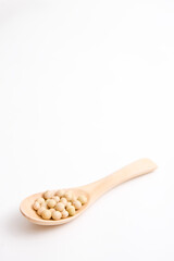 soybean on wooden spoon