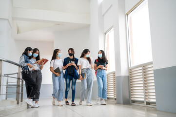 teenage with face mask back at school after covid-19 pandemic quarantine and lockdown,Avoid the...
