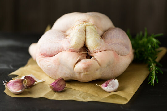 Raw whole chicken for a roast dinner