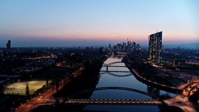 Scenic cityscape and river at dusk, Frankfurt, Hesse, Germany