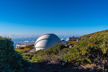 Observatories of the Roque de los Muchachos in the Caldera de Taburiente with a sea of nuts below...