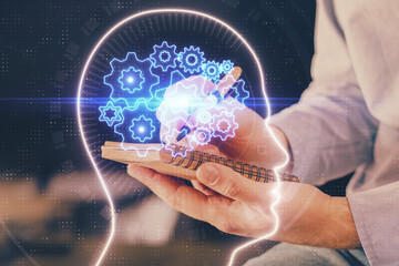 Brain multi exposure icon with man hands background.