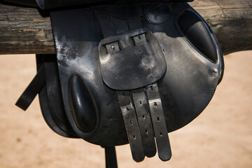 Details close up view of old horse saddle.