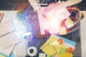 Fototapeta premium Double exposure of writing hand on background with data solution technology hologram. Ai concept.